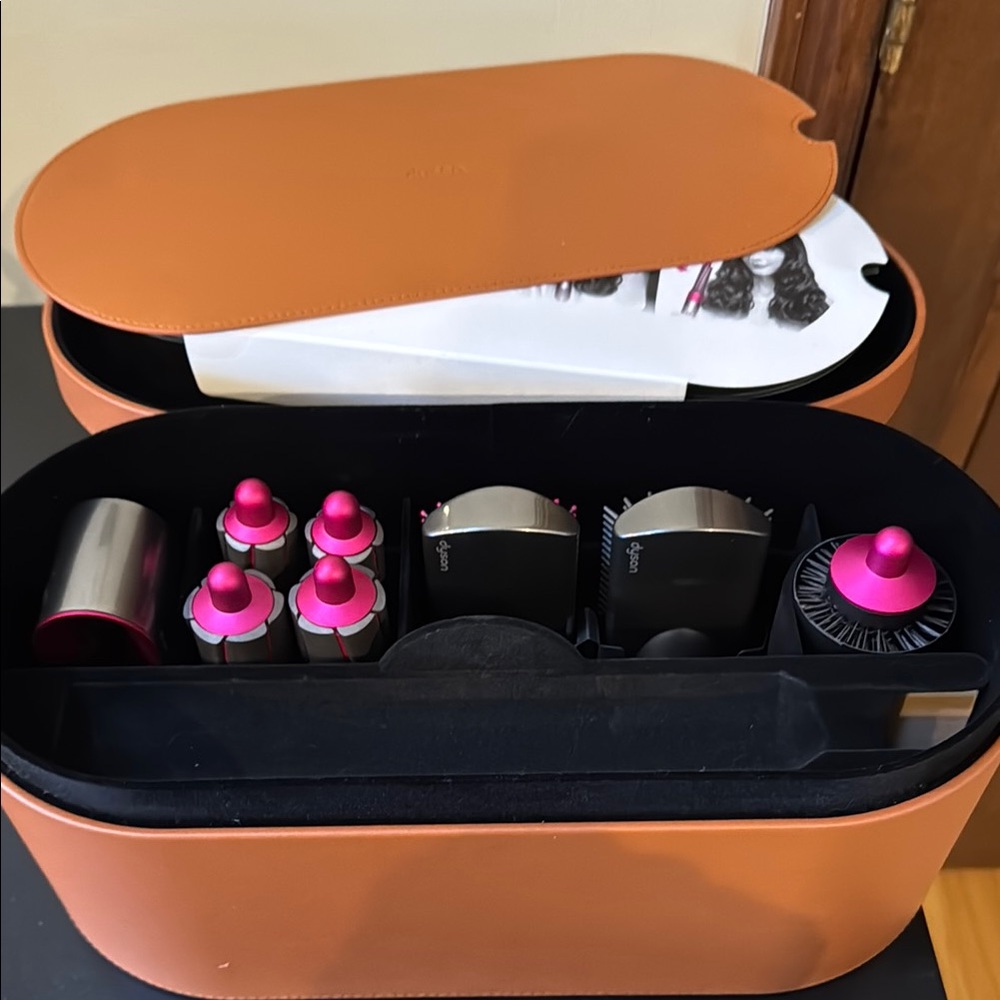 Dyson Tan and Pink Attachment Organizer comes with all the attachments!